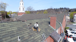 installing a tile roof on a church