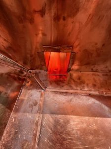 copper gutter reservoir inside view