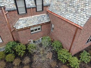 slate roof with copper gutters and downspouts on a home in the Pittsburgh area