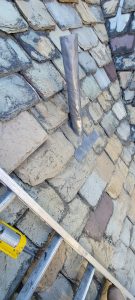 slate tile roof with exhaust pipe