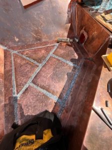 copper roof gutter collection area.